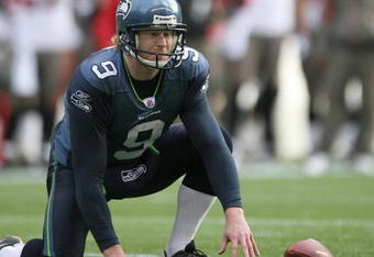 SEATTLE - DECEMBER 20:  Place holder Jon Ryan #9 of the Seattle Seahawks fumbles the snap on a field goal attempt against the Tampa Bay Buccaneers on December 20, 2009 at Qwest Field in Seattle, Washington. The Buccaneers defeated the Seahawks 24-7. (Photo by Otto Greule Jr/Getty Images)