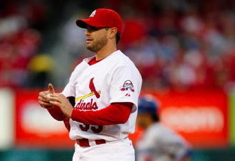 ST. LOUIS, MO - OCTOBER 10:   Starting pitcher Joel Pineiro #35 of the St. Louis Cardinals reacts after giving up a two run homerun to Andre Ethier #16 of the Los Angeles Dodgers in the third inning of Game Three of the NLDS during the 2009 MLB Playoffs at Busch Stadium on October 10, 2009 in St. Louis, Missouri. (Photo by Dilip Vishwanat/Getty Images)