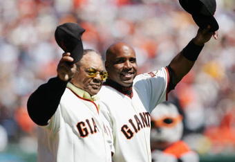 SAN FRANCISCO - APRIL 3:  Willie Mays and Barry Bonds #25 of the San Francisco Giants wave to the crowd before the Opening Day game against the San Diego Padres on April 3, 2007 at AT&T Park in San Francisco, California. The Padres won 7-0. (Photo by Jed Jacobsohn/Getty Images)