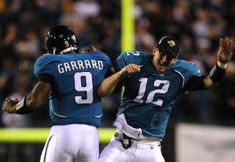 JACKSONVILLE, FL - DECEMBER 17:  David Garrard #9 and Luke McCown #12 of the Jacksonville Jaguars celebrate after Jacksonville scored a touchdown in the first half against the Indianapolis Colts at Jacksonville Municipal Stadium on December 17, 2009 in Jacksonville, Florida.  (Photo by Sam Greenwood/Getty Images)