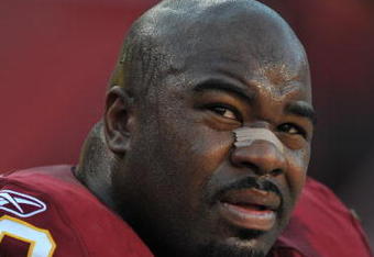 LANDOVER, MD - NOVEMBER 15:  Albert Haynesworth #92 of the Washington Redskins sits on the sidelines during the game against the Denver Broncos at FedExField on November 15, 2009 in Landover, Maryland. The Redskins defeated the Broncos 27-17. (Photo by Larry French/Getty Images)