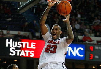 LOUISVILLE, KY - DECEMBER 16:  Terrence Jennings #23 of the Louisville Cardinals dunks the ball during the game against the Oral Roberts Golden Eagles at Freedom Hall on December 16, 2009 in Louisville, Kentucky. Louisville won 94-57. (Photo by Andy Lyons/Getty Images)