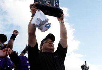 FORT WORTH, TX - NOVEMBER 28:  Head coach Gary Patterson of the TCU Horned Frogs raises the Mountain West Regular Season Championship trophy at Amon G. Carter Stadium on November 28, 2009 in Fort Worth, Texas.  (Photo by Ronald Martinez/Getty Images)