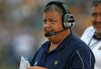 SOUTH BEND, IN - SEPTEMBER 19: Head coach Charlie Weis of the Notre Dame Fighting Irish watches as his team takes on the Michigan State Spartans on September 19, 2009 at Notre Dame Stadium in South Bend, Indiana. Notre Dame defeated Michigan State 33-30. (Photo by Jonathan Daniel/Getty Images)