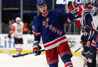 NEW YORK - DECEMBER 26:  Brandon Dubinsky #17 of the New York Rangers celebrates his second goal against the New York Islanders on December 26, 2009 at Madison Square Garden in New York City. (Photo by Jim McIsaac/Getty Images)