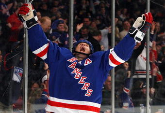 NEW YORK - DECEMBER 23:  Vinny Prospal #20 of the New York Rangers celebrates his second period goal against the Florida Panthers on  December 23, 2009 at Madison Square Garden in New York City.  (Photo by Jim McIsaac/Getty Images)