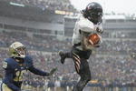 PITTSBURGH - DECEMBER 05:  Mardy Gilyard #1 of the Cincinnati Bearcats catches a two point conversion against the University of Pittsburgh Panthers on December 5, 2009 at Heinz Field in Pittsburgh, Pennsylvania.  (Photo by Jared Wickerham/Getty Images)