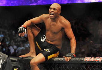 PHILADELPHIA - AUGUST 08:  Anderson Silva celebrates after defeating Forrest Griffin during their light heavyweight bout at UFC 101: Declaration at the Wachovia Center on August 8, 2009 in Philadelphia, Pennsylvania.  (Photo by Jon Kopaloff/Getty Images)