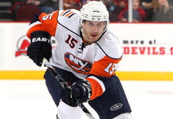 NEWARK, NJ - NOVEMBER 28:  Jeff Tambellini #15 of the New York Islanders skates against the New Jersey Devils at the Prudential Center on November 28, 2009 in Newark, New Jersey.  (Photo by Jim McIsaac/Getty Images)