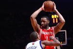 NEW YORK - JANUARY 26:  Tracy McGrady #1 of the Houston Rockets looks to play the ball against Chris Duhon #1 of the New York Knicks on January 26, 2009 at Madison Square Garden in New York City.  NOTE TO USER: User expressly acknowledges and agrees that, by downloading and/or using this Photograph, User is consenting to the terms and conditions of the Getty Images License Agreement.  (Photo by Chris McGrath/Getty Images)