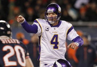 CHICAGO - DECEMBER 28:  Brett Favre #4 of the Minnesota Vikings points from under center in the third quarter against the Chicago Bears at Soldier Field on December 28, 2009 in Chicago, Illinois. (Photo by Jonathan Daniel/Getty Images)