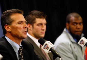 NEW ORLEANS - DECEMBER 27:  (L-R) Head coach Urban Meyer, Tim Tebow and Ryan Stamper of the University of Florida Gators speak during a press conference on December 27, 2009 in New Orleans, Louisiana.  Meyer is going to take a leave of absense from the team due to health concerns.  (Photo by Chris Graythen/Getty Images)
