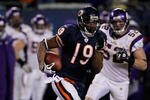 CHICAGO - DECEMBER 28: Devin Aromashodu #19 of the Chicago Bears runs for yardage after making a first down catch as Chad Greenway #52 of the Minnesota Vikings pursues at Soldier Field on December 28, 2009 in Chicago, Illinois. The Bears defeated the Vikings 36-30 in overtime. (Photo by Jonathan Daniel/Getty Images)