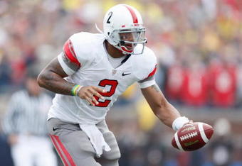ANN ARBOR, MI - NOVEMBER 21:  Quarterback Terrelle Pryor #2 of the Ohio State Buckeyes hands off the ball during the game against the Michigan Wolverines on November 21, 2009 at Michigan Stadium in Ann Arbor, Michigan. Ohio State won the game 21-10. (Photo by Gregory Shamus/Getty Images)