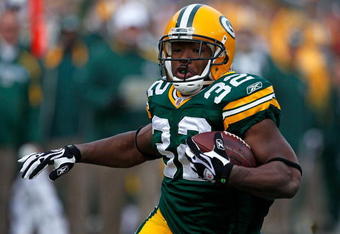 GREEN BAY, WI - DECEMBER 27: Brandon Jackson #32 of the Green Bay Packers runs for a touchdown against the Seattle Seahawks at Lambeau Field on December 27, 2009 in Green Bay, Wisconsin. (Photo by Jonathan Daniel/Getty Images)