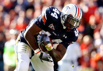 AUBURN, AL - NOVEMBER 27:  Ben Tate #44 of the Auburn Tigers against the Alabama Crimson Tide at Jordan-Hare Stadium on November 27, 2009 in Auburn, Alabama.  (Photo by Kevin C. Cox/Getty Images)