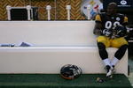 PITTSBURGH - DECEMBER 6: James Harrison #92 of the Pittsburgh Steelers sits on the bench following their loss to the Oakland Raiders on December 6, 2009 at Heinz Field in Pittsburgh, Pennsylvania. (Photo by Jared Wickerham/Getty Images)
