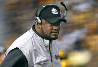 PITTSBURGH - DECEMBER 27:  Head coach Mike Tomlin of the Pittsburgh Steelers looks on while playing the Baltimore Ravens on December 27, 2009 at Heinz Field in Pittsburgh, Pennsylvania. Pittsburgh won the game 23-20. (Photo by Gregory Shamus/Getty Images)