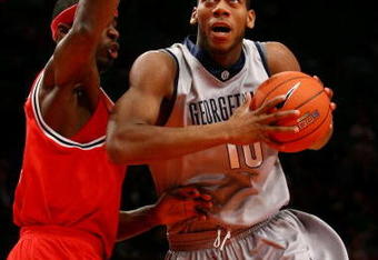 NEW YORK - MARCH 10:  Greg Monroe #10 of the Georgetown Hoyas goes to the hoop against Justin Burrell #24 of the St. John's Red Storm during the first round of the Big East Tournament at Madison Square Garden on March 10, 2009 in New York City.  (Photo by Chris McGrath/Getty Images)