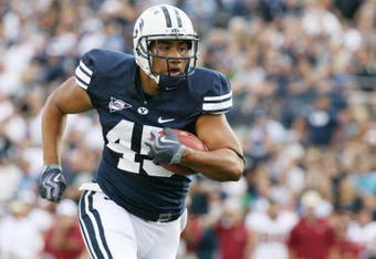 PROVO, UT - SEPTEMBER 19:  Harvey Unga #45 of Brigham Young University Cougars runs the football against Florida State Seminoles at La Vell Edwards Stadium on September 19, 2009 in Provo, Utah.  (Photo by Melissa Majchrzak via Getty Images)