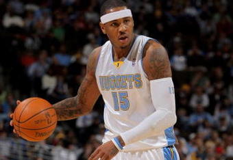 DENVER - OCTOBER 28:  Carmelo Anthony #15 of the Denver Nuggets dribbles the ball upcourt against the Utah Jazz during NBA action at Pepsi Center on October 28, 2009 in Denver, Colorado. The Nuggets defeated the Jazz 114-105.  (Photo by Doug Pensinger/Getty Images)