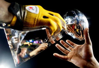 TAMPA, FL - FEBRUARY 01:  Players from the Pittsburgh Steelers celebrate with the Vince Lombardi trophy after their 27-23 win against the Arizona Cardinals during Super Bowl XLIII on February 1, 2009 at Raymond James Stadium in Tampa, Florida.  (Photo by Jamie Squire/Getty Images)