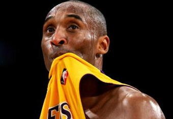 LOS ANGELES, CA - DECEMBER 29:  Kobe Bryant #24 of the Los Angeles Lakers goes to the bench in the game against the Golden State Warriors on December 29, 2009 at Staples Center in Los Angeles, California.  The Lakers won 124-118.  NOTE TO USER: User expressly acknowledges and agrees that, by downloading and/or using this Photograph, user is consenting to the terms and conditions of the Getty Images License Agreement.  (Photo by Stephen Dunn/Getty Images)