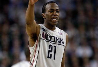 DETROIT - APRIL 04:  Stanley Robinson #21 of the Connecticut Huskies reacts while taking on the Michigan State Spartans during the National Semifinal game of the NCAA Division I Men's Basketball Championship at Ford Field on April 4, 2009 in Detroit, Michigan.  (Photo by Andy Lyons/Getty Images)