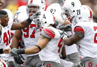 ANN ARBOR, MI - NOVEMBER 21:  Kurt Coleman of the Ohio State Buckeyes celebrates a second quarter interception with teammates while playing the Michigan Wolverines on November 21, 2009 at Michigan Stadium in Ann Arbor, Michigan.  (Photo by Gregory Shamus/Getty Images)