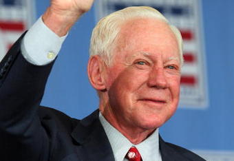 COOPERSTOWN, NY - JULY 26:  Hall of Famer Whitey Ford waves to the crowd as he is introduced at Clark Sports Center during the 2009  Baseball Hall of Fame induction ceremony on July 26, 2009 in Cooperstown, New York.  (Photo by Jim McIsaac/Getty Images)