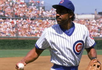 CHICAGO - 1989:  Andre Dawson #8 of the Chicago Cubs walks on the field with a ball in his hand during a game in 1989 at Wrigley Field in Chicago, Illinois.  (Photo by Jonathan Daniel/Getty Images)     