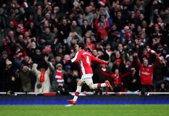LONDON, ENGLAND - DECEMBER 27:  Cesc Fabregas (#4) of Arsenal celebrates after he scores a free kick during the Barclays Premier League match between Arsenal and Aston Villa at the Emirates Stadium on December 27, 2009 in London, England.  (Photo by David Cannon/Getty Images)