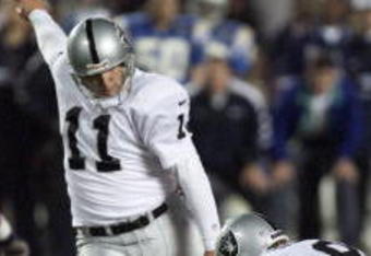 29 Oct 2000:  Sebastian Janikowski #11 of the Oakland Raiders kicks the game winning field goal during their game against the San Diego Chargers at Qualcomm Stadium in San Diego, California. The Raiders defeated the Chargers 15-13. DIGITAL IMAGE. Mandatory Credit: Stephen Dunn/ALLSPORT