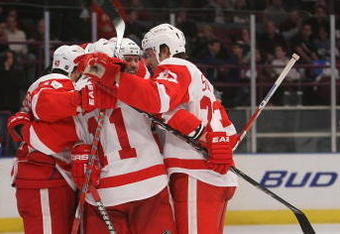NEW YORK - DECEMBER 06:  The Detroit Red Wings celebrate the goal of Dan Cleary #11 in the third period against the New York Rangers on December 6, 2009 at Madison Square Garden in New York City.  (Photo by Nick Laham/Getty Images)