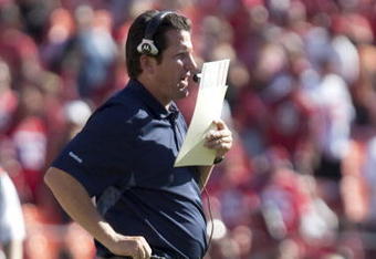 SAN FRANCISCO - SEPTEMBER 20:  Greg Knapp, offensive coordinator for the Seattle Seahawks calls in a play during 4th quarter action during home opener as the San Francisco 49ers host the Seattle Seahawks at Candlestick Park September 20, 2009 in San Francisco, California. (Photo by David Paul Morris/Getty Images)