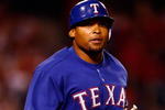 ANAHEIM, CA - JULY 07:  Marlon Byrd #22 of the Texas Rangers runs to first base against the Los Angeles Angels of Anaheim at Angel Stadium on July 7, 2009 in Anaheim, California.  (Photo by Jeff Gross/Getty Images)