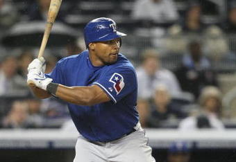 NEW YORK - JUNE 03:  Marlon Byrd #22 of the Texas Rangers bats against the New York Yankees on June 3, 2009 at Yankee Stadium in the Bronx borough of New York City.  (Photo by Nick Laham/Getty Images)