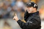 PITTSBURGH - DECEMBER 27:  Head coach John Harbaugh of the Baltimore Ravens looks on while playing the Pittsburgh Steelers on December 27, 2009 at Heinz Field in Pittsburgh, Pennsylvania. Pittsburgh won the game 23-20.  (Photo by Gregory Shamus/Getty Images)