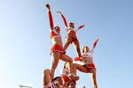 JACKSONVILLE, FL - DECEMBER 1:  Tech cheerleaders perform as the Virginia Tech Hokies take on the Boston College Eagles in the ACC Championship Game at Jacksonville Municipal Stadium December 1, 2007 in Jacksonville, Florida. Virginia Tech defeated Boston College 30-16.  (Photo by Doug Benc/Getty Images)