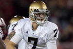 PALO ALTO, CA - NOVEMBER 28:  Jimmy Clausen #7 of the Notre Dame Fighting Irish in action during their game against the Stanford Cardinal at Stanford Stadium on November 28, 2009 in Palo Alto, California.  (Photo by Ezra Shaw/Getty Images)