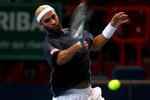 PARIS - NOVEMBER 11:  James Blake of the U.S. hits a return against Andy Murray of Great Britain during the ATP Masters Series at the Palais Omnisports De Paris-Bercy on November 11, 2009 in Paris, France.  (Photo by Clive Rose/Getty Images)