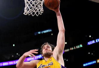 LOS ANGELES - NOVEMBER 15:  Pau Gasol #16 of the Los Angeles Lakers goes up for a dunk against the Golden State Warriors on December 29, 2009 at Staples Center in Los Angeles, California.  NOTE TO USER: User expressly acknowledges and agrees that, by downloading and/or using this Photograph, user is consenting to the terms and conditions of the Getty Images License Agreement.   (Photo by Stephen Dunn/Getty Images)