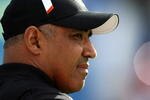 SAN DIEGO - DECEMBER 20:  Head coach Marvin Lewis of the Cincinnati Bengals wqtches warmups for the game with the San Diego Chargers on December 20, 2009 at Qualcomm Stadium in San Diego, California.  The Chargers won 27-24.  (Photo by Stephen Dunn/Getty Images)