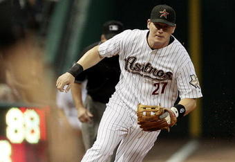 HOUSTON - SEPTEMBER 23:  Third baseman Geoff Blum #27 of the Houston Astros fields a slow roller down the third base line at Minute Maid Park on September 23, 2009 in Houston, Texas. Houston won 3-0.  (Photo by Bob Levey/Getty Images)
