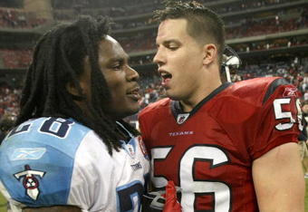HOUSTON - NOVEMBER 23:  Running back Chris Johnson #28 of the Tennessee Titans greets linebacker Brian Cushing #56 of the Houston Texans on November 23, 2009  at Reliant Stadium in Houston, Texas.  The Titans won 20-17.  (Photo by Stephen Dunn/Getty Images)