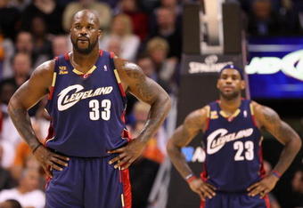 PHOENIX - DECEMBER 21:  Shaquille O'Neal #33 and LeBron James #23 of the Cleveland Cavaliers wait downcourt during the NBA game against the Phoenix Suns at US Airways Center on December 21, 2009 in Phoenix, Arizona. The Cavaliers defeated the Suns 109-91.  NOTE TO USER: User expressly acknowledges and agrees that, by downloading and or using this photograph, User is consenting to the terms and conditions of the Getty Images License Agreement.  (Photo by Christian Petersen/Getty Images)