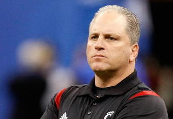 NEW ORLEANS - JANUARY 01:  Interim head coach Jeff Quinn of the Cincinnati Bearcats stands on the field before the Allstate Sugar Bowl against the Florida Gators at the Louisana Superdome on January 1, 2010 in New Orleans, Louisiana.  (Photo by Kevin C. Cox/Getty Images)