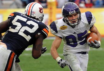 TAMPA, FL - JANUARY 1: Wide receiver Zeke Markshausen #85 of the Northwestern Wildcats rushes upfield against the Auburn Tigers in the Outback Bowl January 1, 2010 at Raymond James Stadium in Tampa, Florida.  (Photo by Al Messerschmidt/Getty Images)