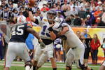 TAMPA, FL - JANUARY 1: Quarterback Mike Kafka #13 of the Northwestern Wildcats releases a pass against the Auburn Tigers in the Outback Bowl January 1, 2010 at Raymond James Stadium in Tampa, Florida.  (Photo by Al Messerschmidt/Getty Images)