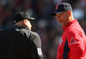 BOSTON - OCTOBER 11:  Terry Francona #47 manager of the Boston Red Sox argues a call with the home plate umpire that Mike Napoli #44 was hit by a pitch in the second inning of Game Three of the ALDS against against the Los Angeles Angels of Anaheim during the 2009 MLB Playoffs at Fenway Park on October 11, 2009 in Boston, Massachusetts. (Photo by Elsa/Getty Images)